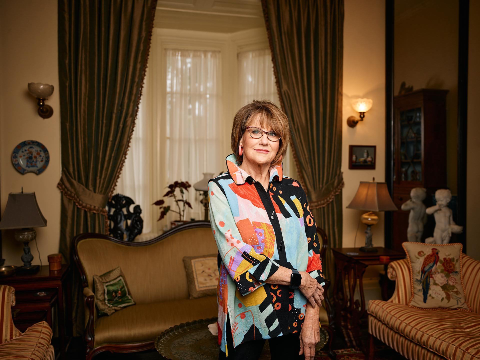 Betsy Haywood, standing in the Haywood House parlor (photograph by Joshua Steadman)