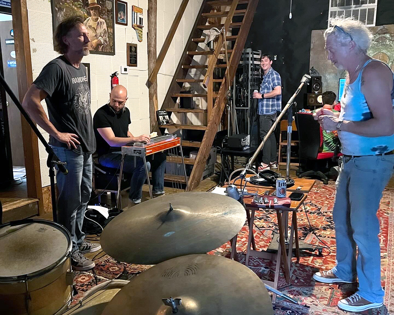 Smith, left, and Mathus, right, at Zebra Ranch Studio during the recording of <i>Lostville</i>, with band members Kell Kellum (seated) and Eric Carlton