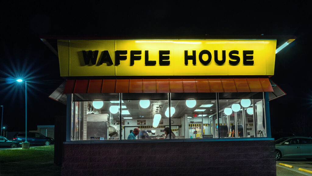 A Waffle House at night, where the women in this poem works, sometimes triple shifts.