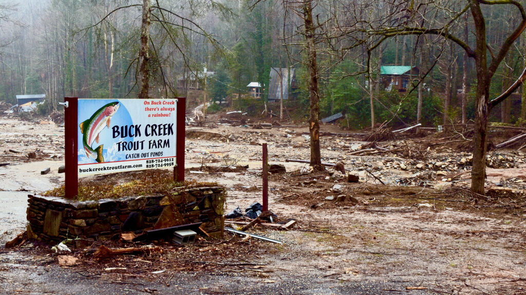 Damage from Hurricane Helene at Buck Creek Trout Farm in McDowell County, North Carolina, highlights the resilience of rural communities like Old Fort. Discover how this small Western NC town is rebuilding stronger through unity, innovative rural development, and economic revitalization through outdoor recreation.